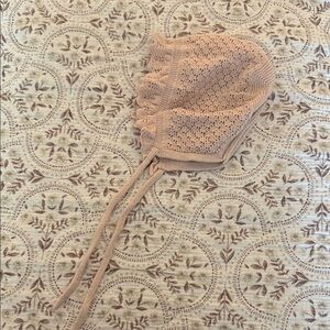 Charming Tan Knitted Baby Bonnet